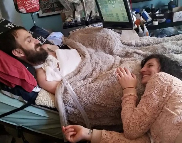 Steve and Hope Dezember with his Tobii eye gaze device at home in March 2015. Courtesy of Hope Dezember